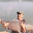 沈阳一男子在棋盘山水库钓到体重117斤大鱼 - 辽宁频道
